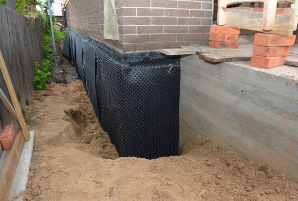 SJ Waterproofing Pros technician performing targeted Waterproofing assessment in Portageville, NY